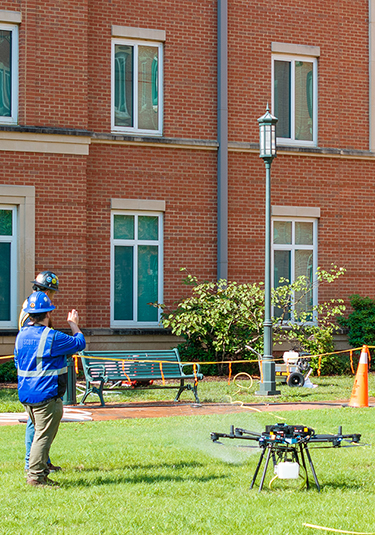 Drone operator with window cleaning drone