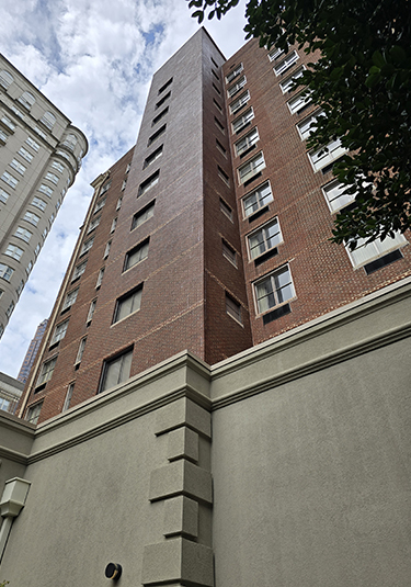 After façade pressure washing and translucent coating