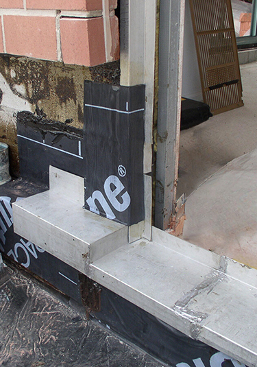 Through-wall flashing installed at slider door opening